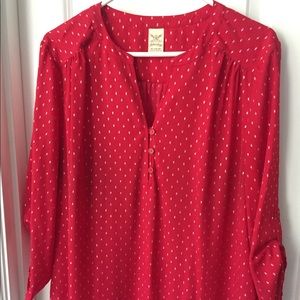 Red power top. Very flattering